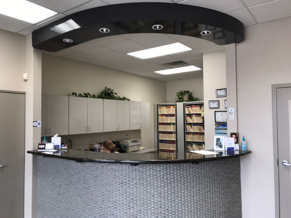 Front desk and reception area at Dr. Razdolsky's dental office in Buffalo Grove